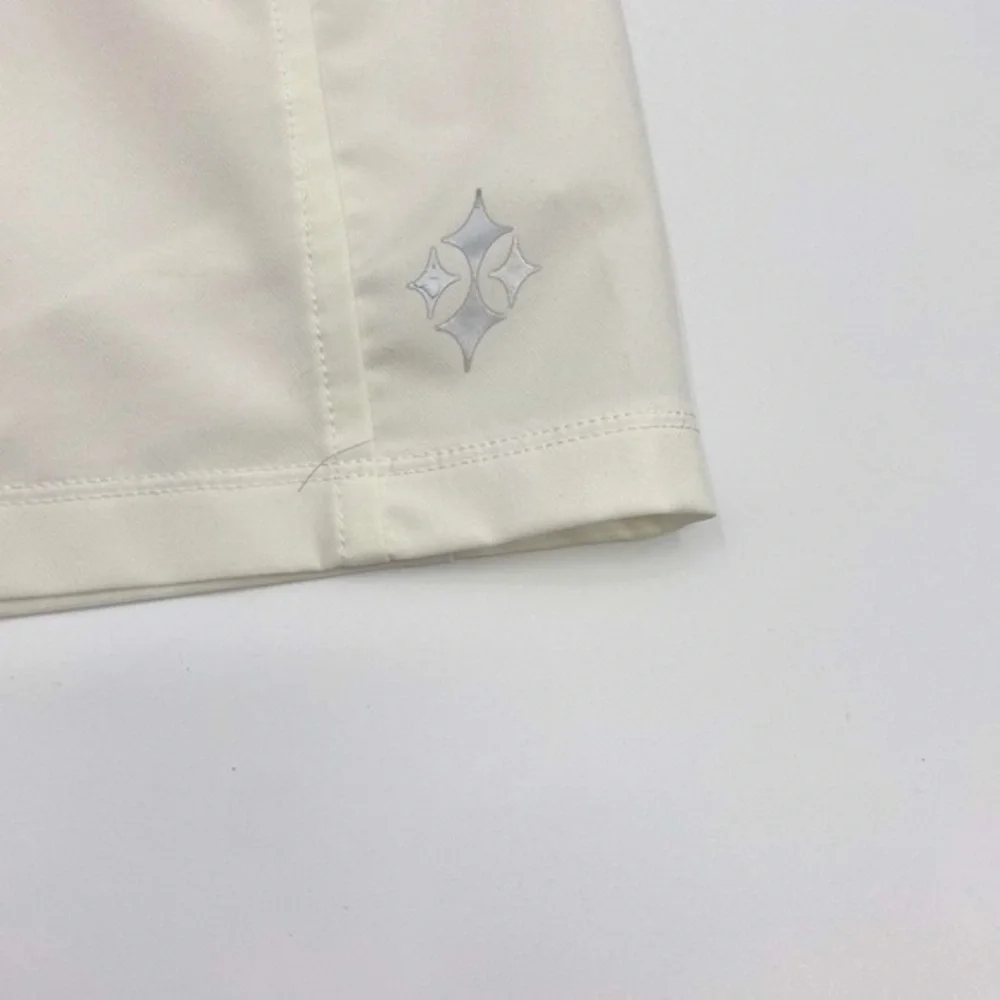 UEC Jofit essential golf skort white size “2” equivalent small tag cut out